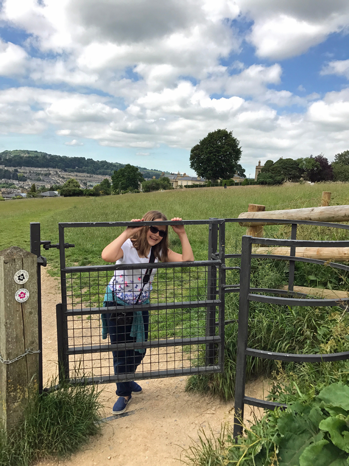 girl out walking at the gate