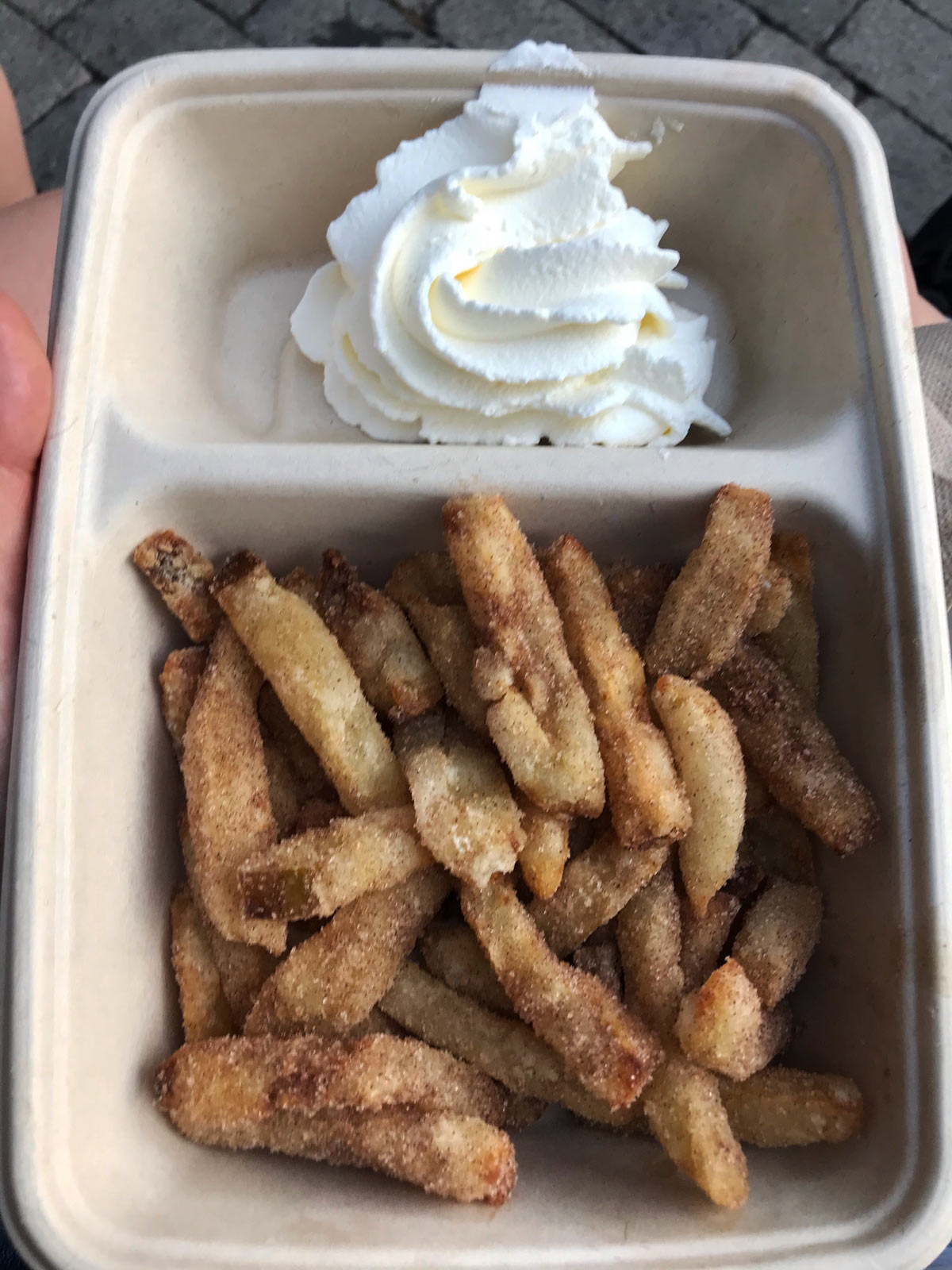 apple fries with whipped cream in box.