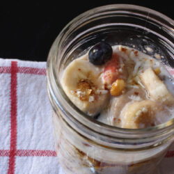 closeup of overnight oats with berries and bananas.