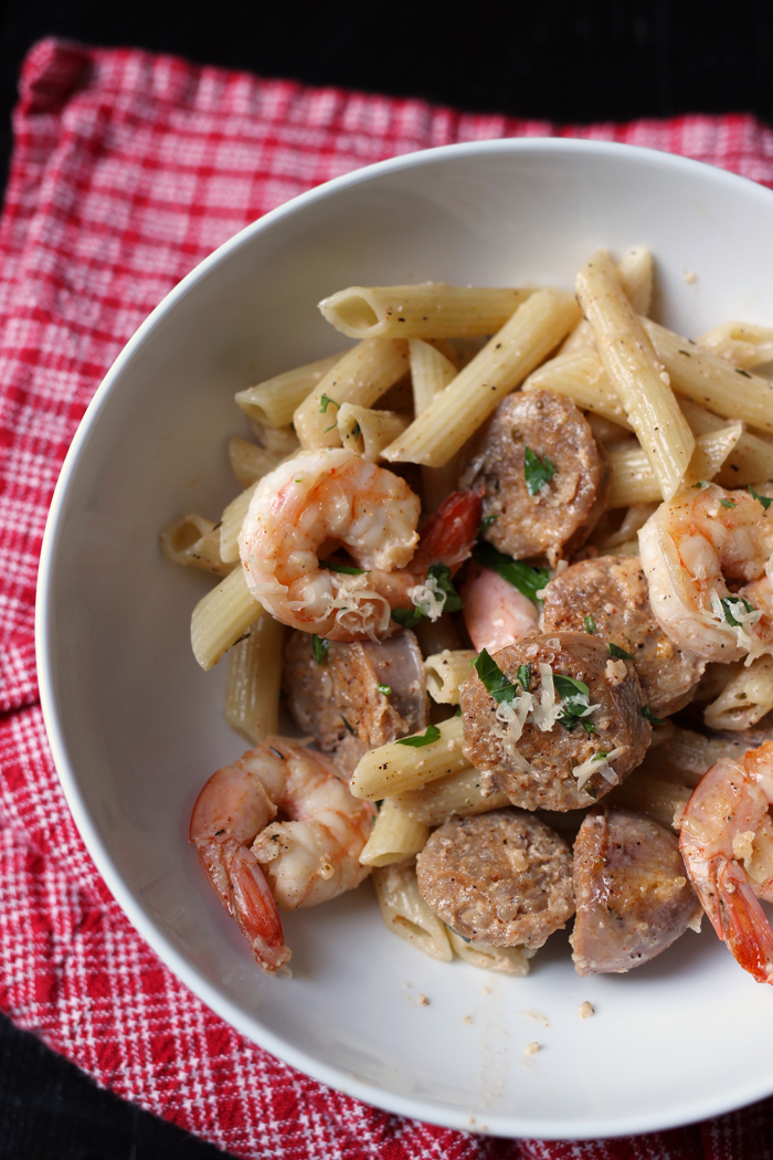 individual bowl of creamy shrimp pasta with sausage