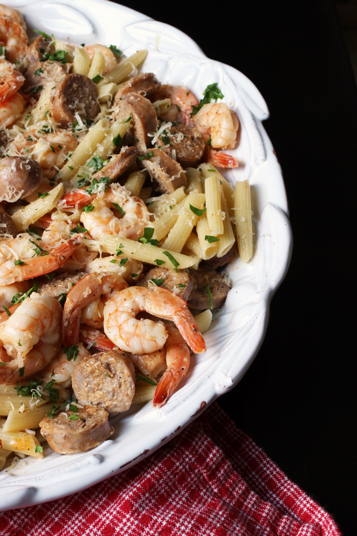 large bowl of creamy pasta with red towel