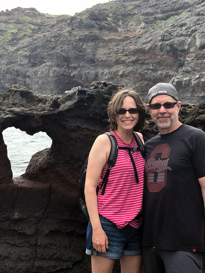 couple by the heart shaped rock at nakalele blow hole