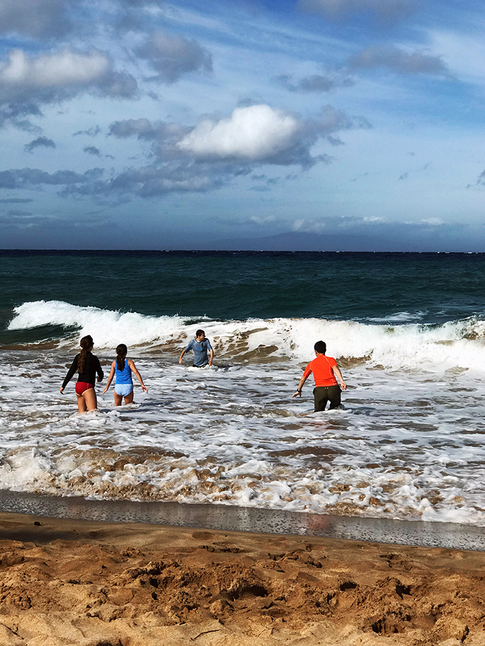 kids playing in surf
