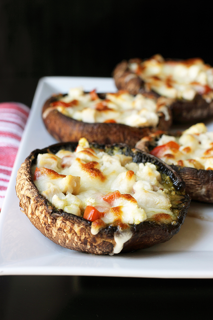 four portobello pizzas on serving tray