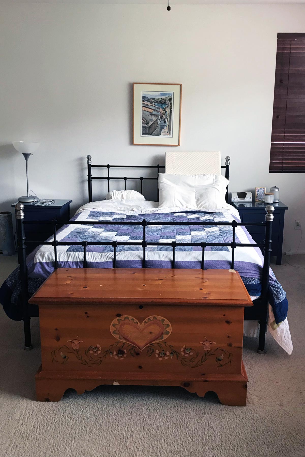 bedroom with bed and cedar chest