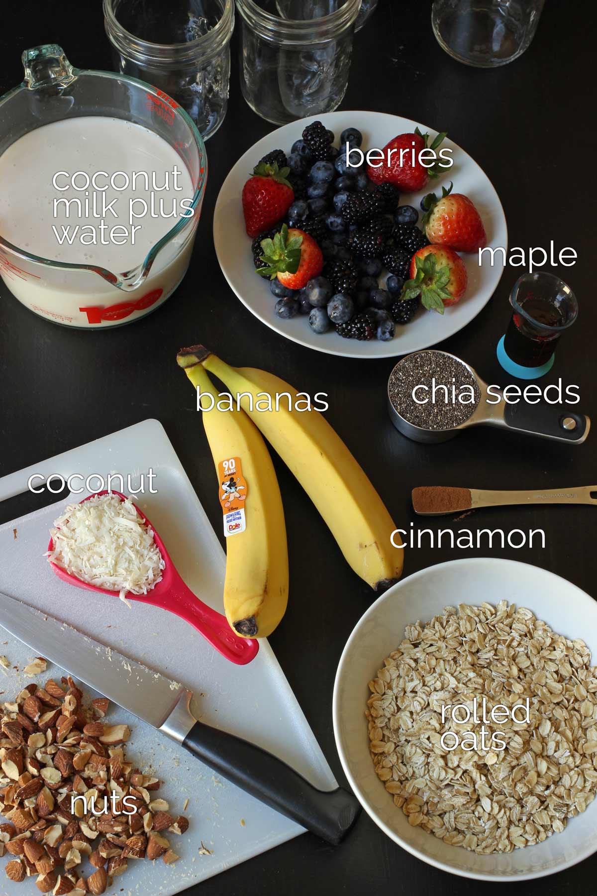 ingredients for overnight oats laid out on table top.