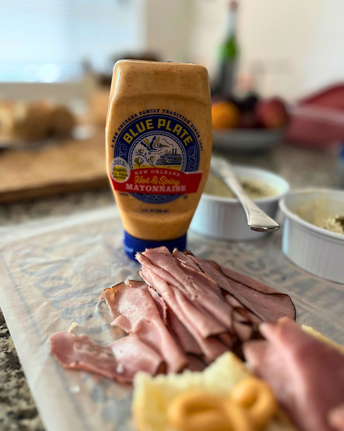 sandwich bar with a container of blue plate mayo.