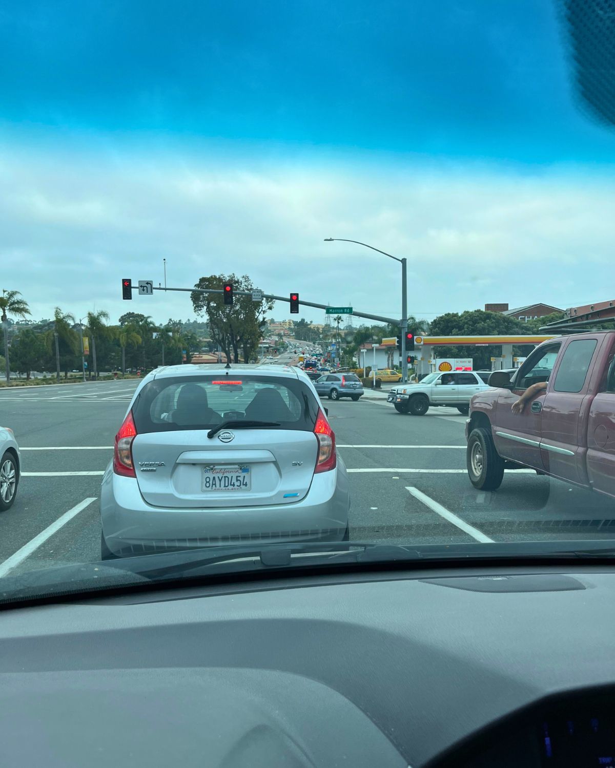 cars in traffic on a summer day.