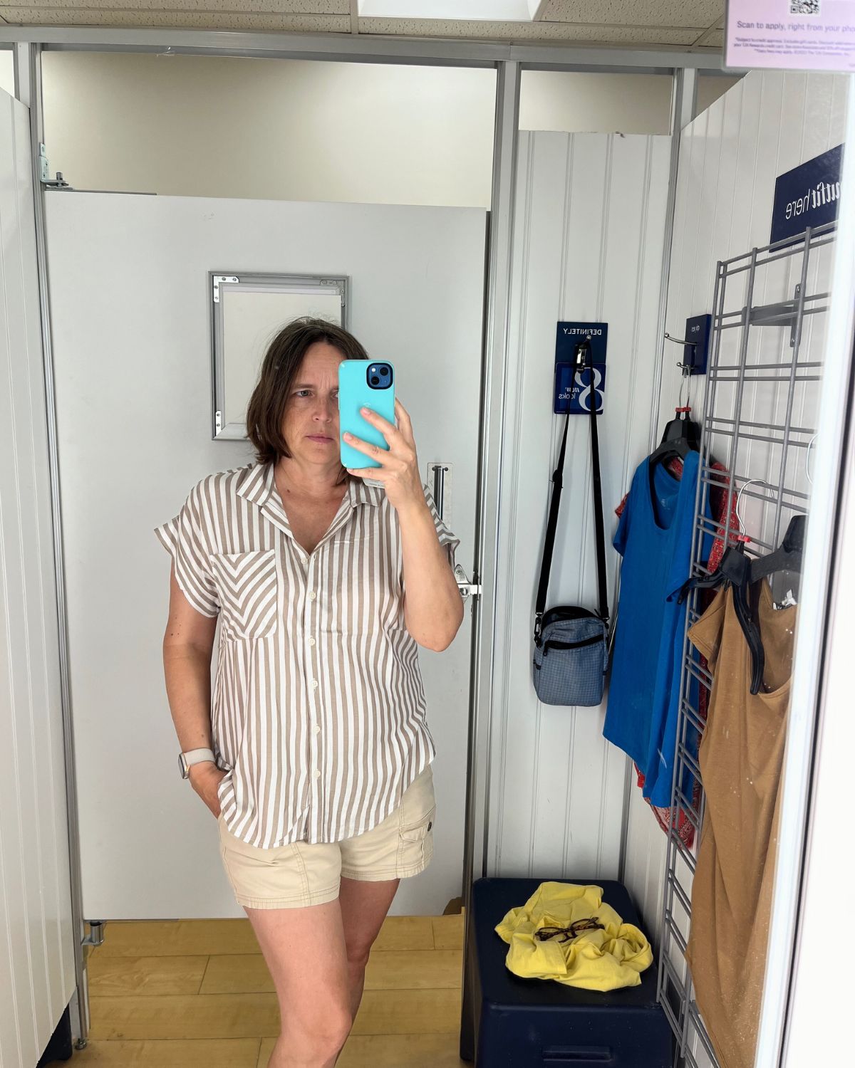 trying on clothes at marshalls.