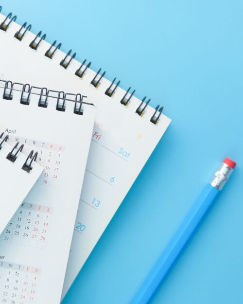 calendars on blue background.