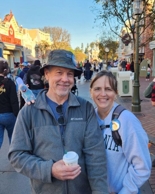 bryan and jessica on main street disneyland.