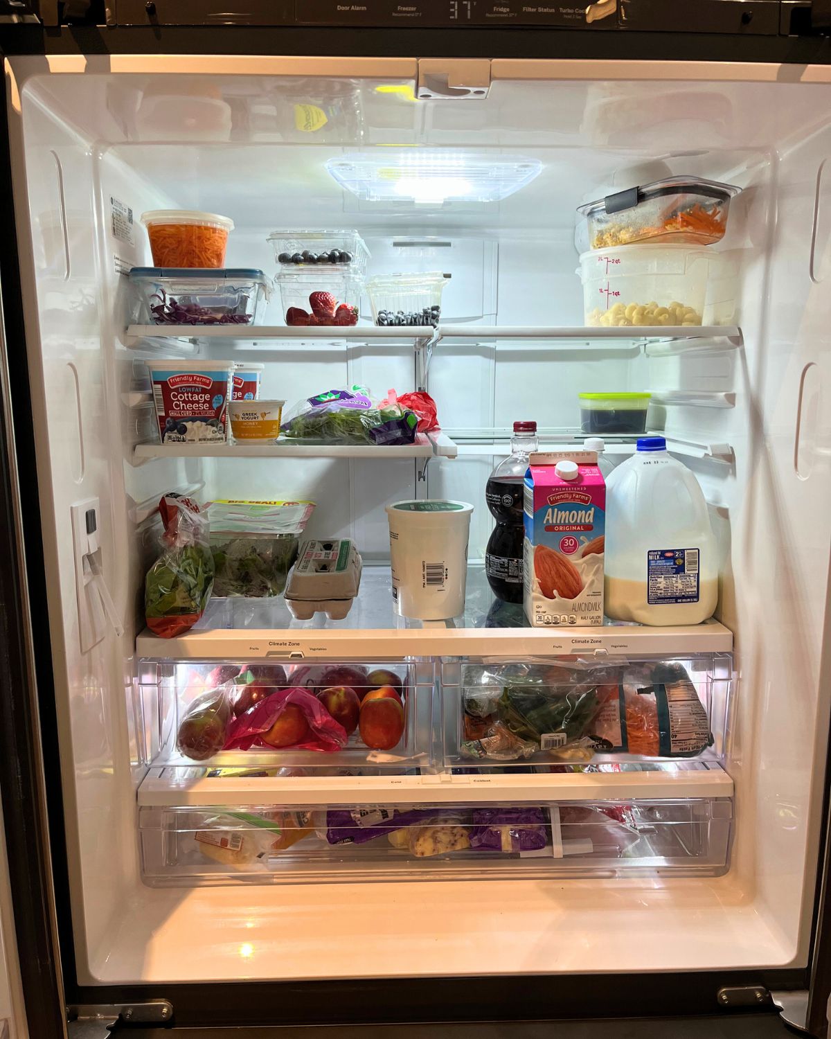 clean fridge mostly empty.