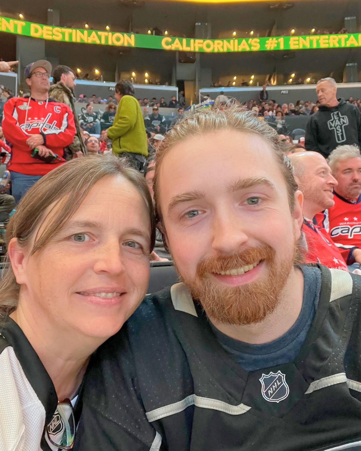 FisherMan27 and me at the hockey game.