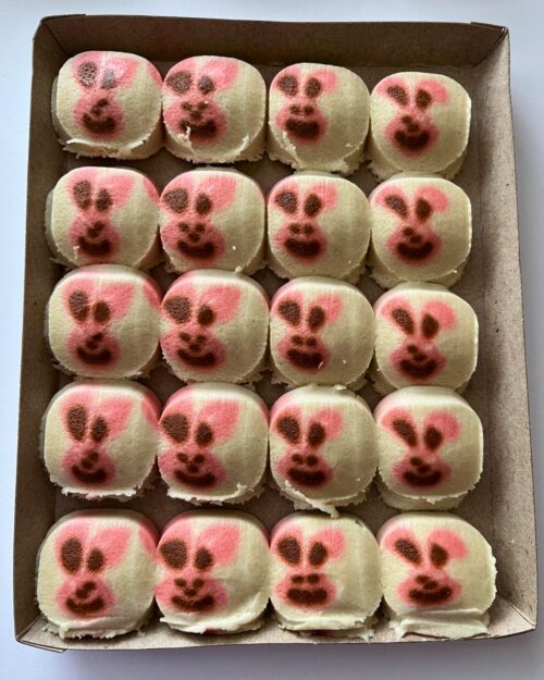 freaky bunny cookies in cardboard carton.