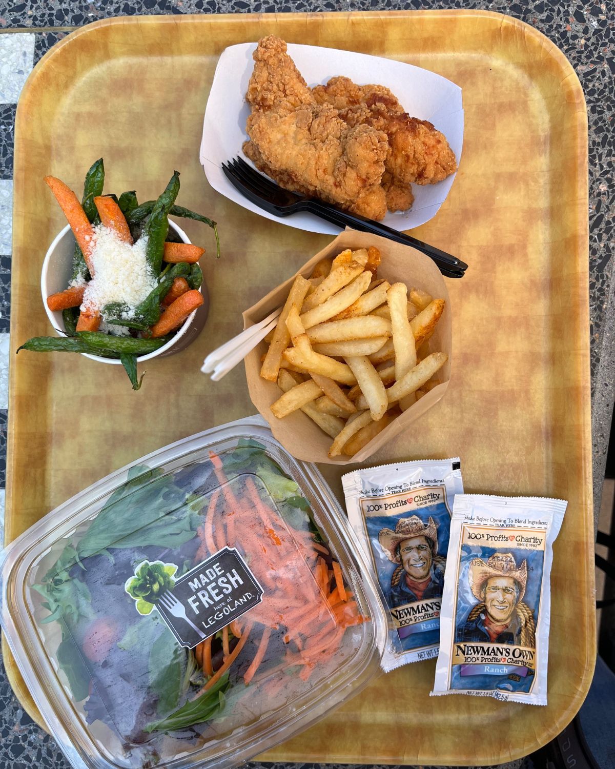 meal from legoland bbq with lots of veggies.