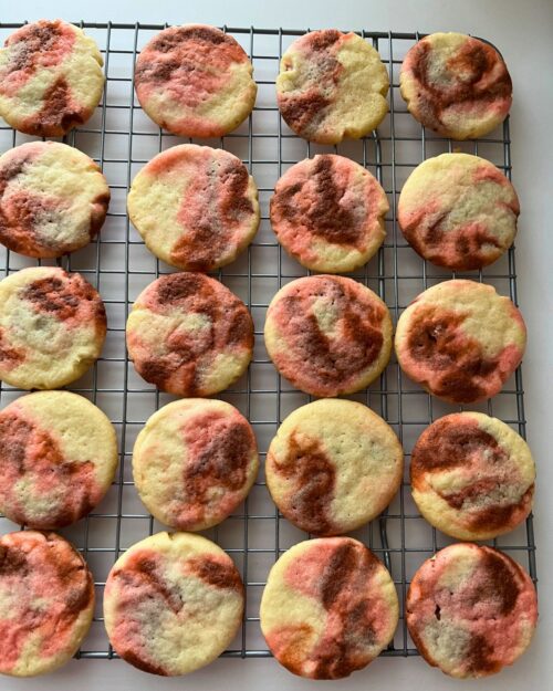 cute marble swirl cookies on rack.