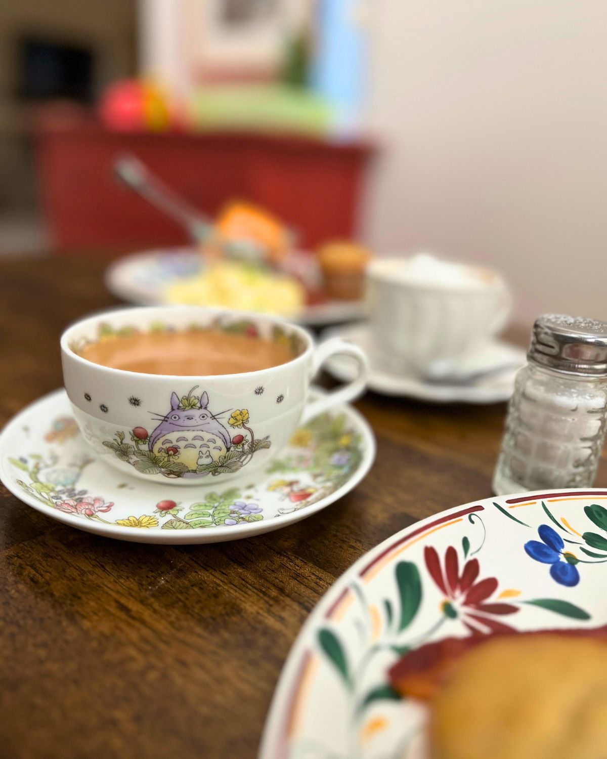 totoro tea cup on breakfast table.
