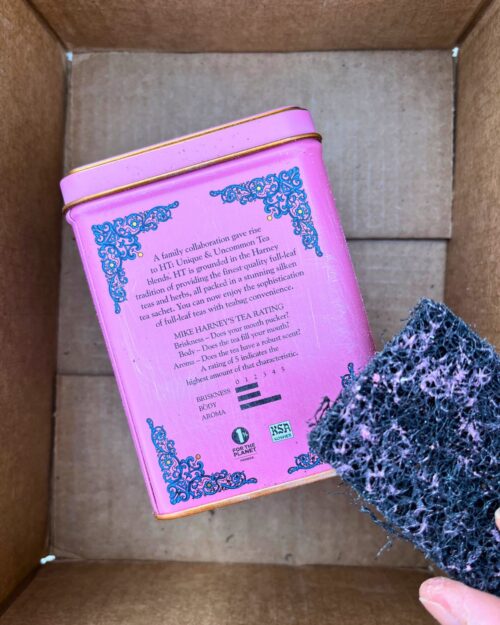 scuffing tea tin with steel wool. 