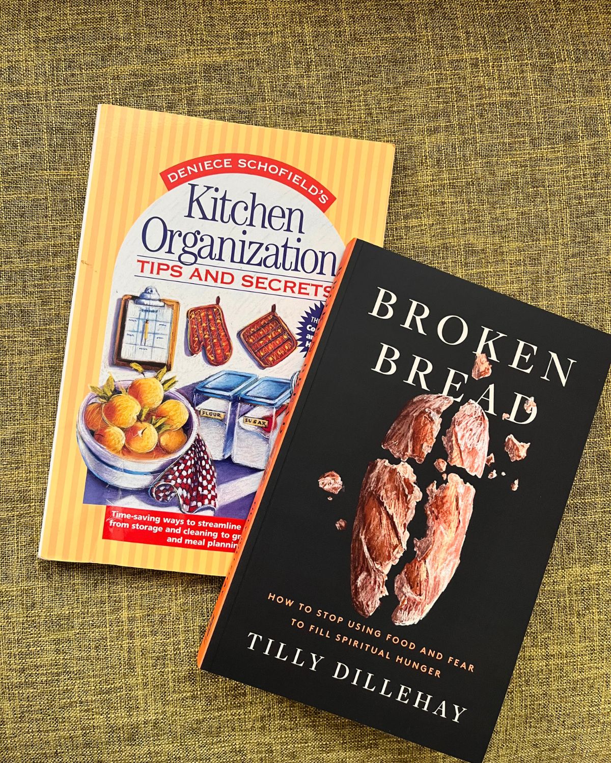 two books on a green background.