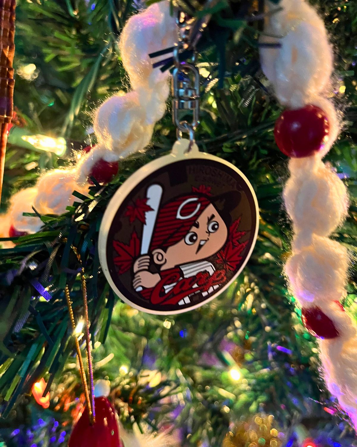 Carp boy from Hiroshima on a glow-in-the-dark keychain.