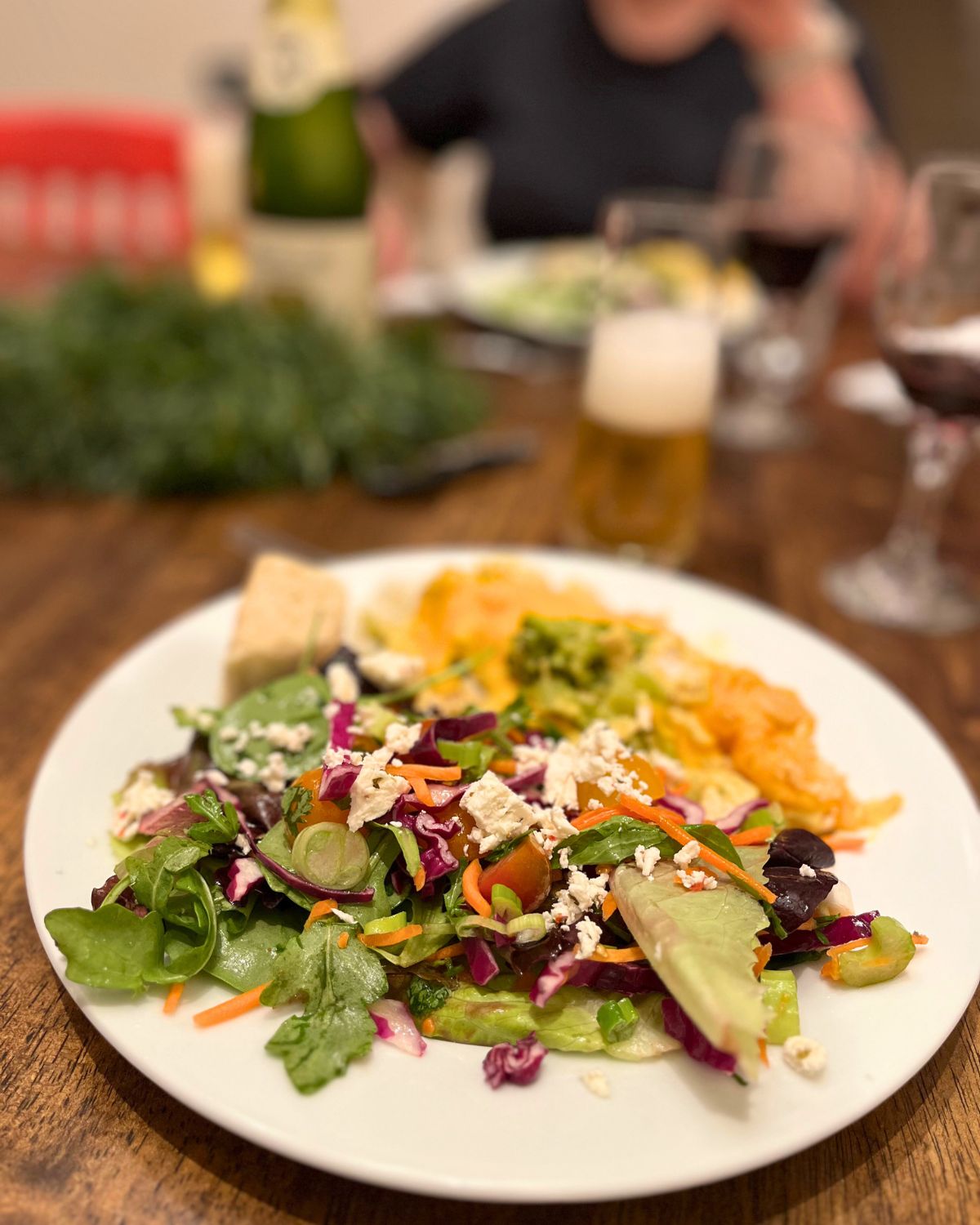 sunday dinner plate on set table.
