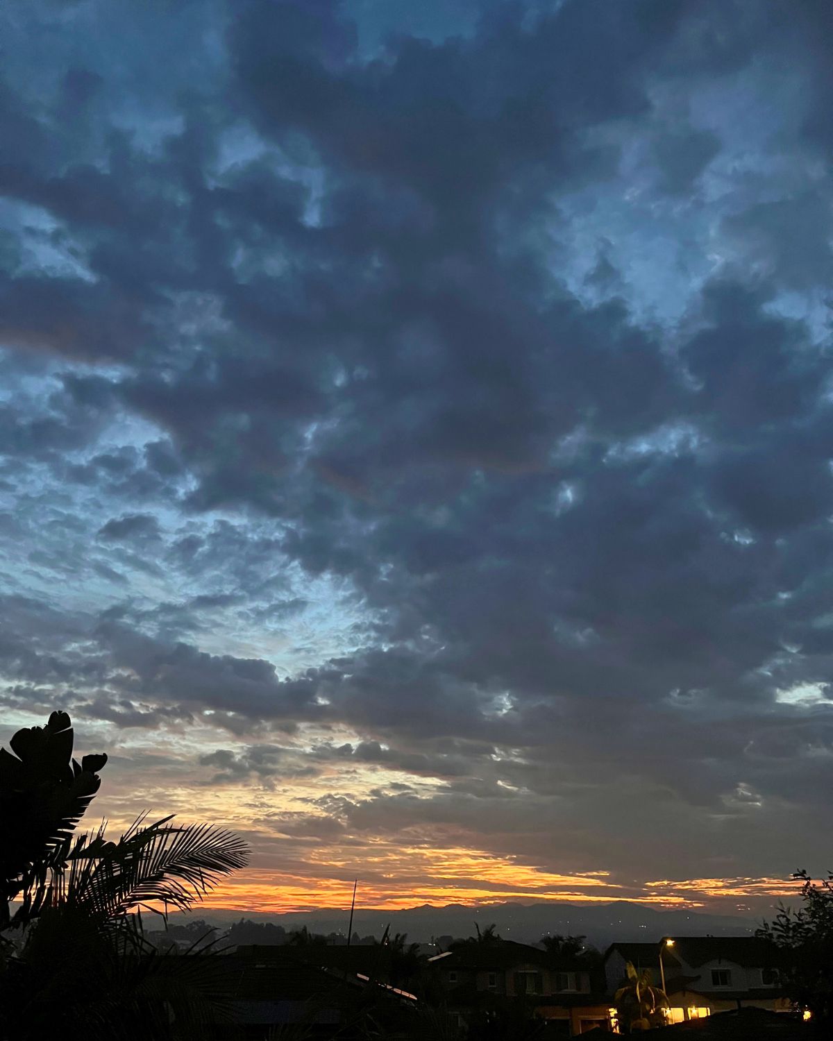 sunrise over a clouded sky.