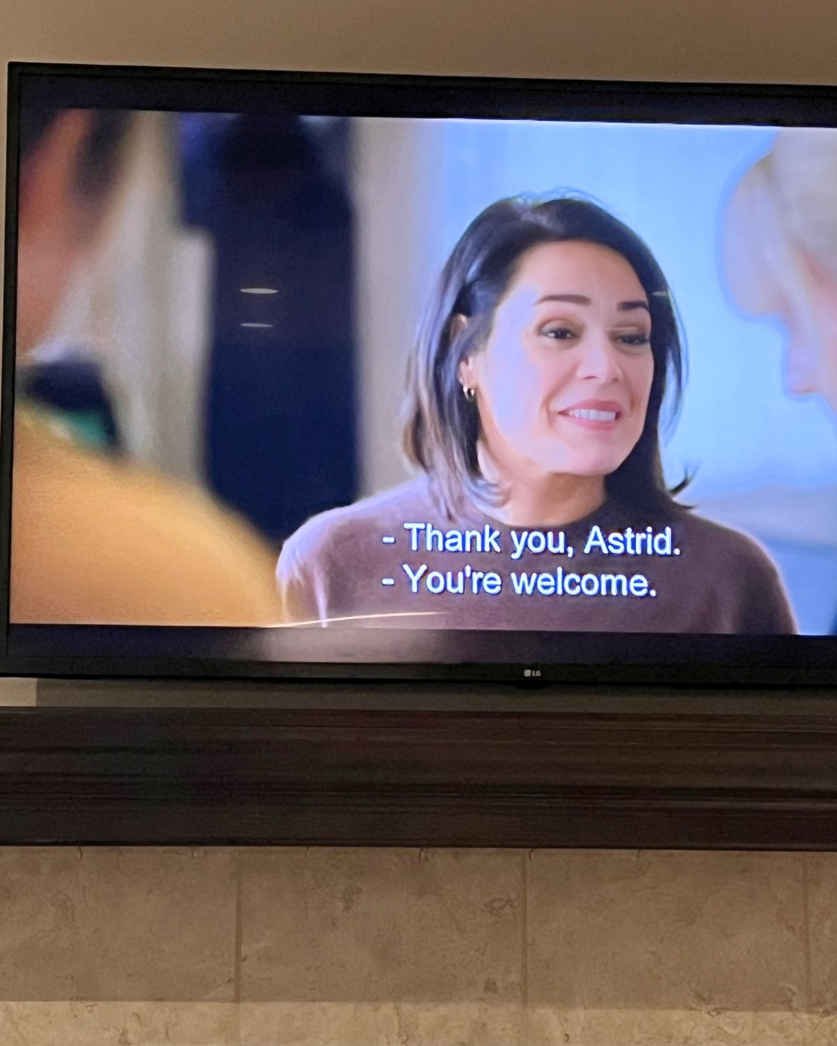 shot of tv screen of astrid and raphaelle.