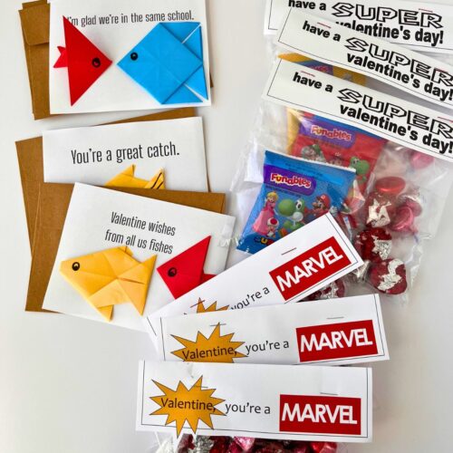 array of homemade valentines in primary colors.