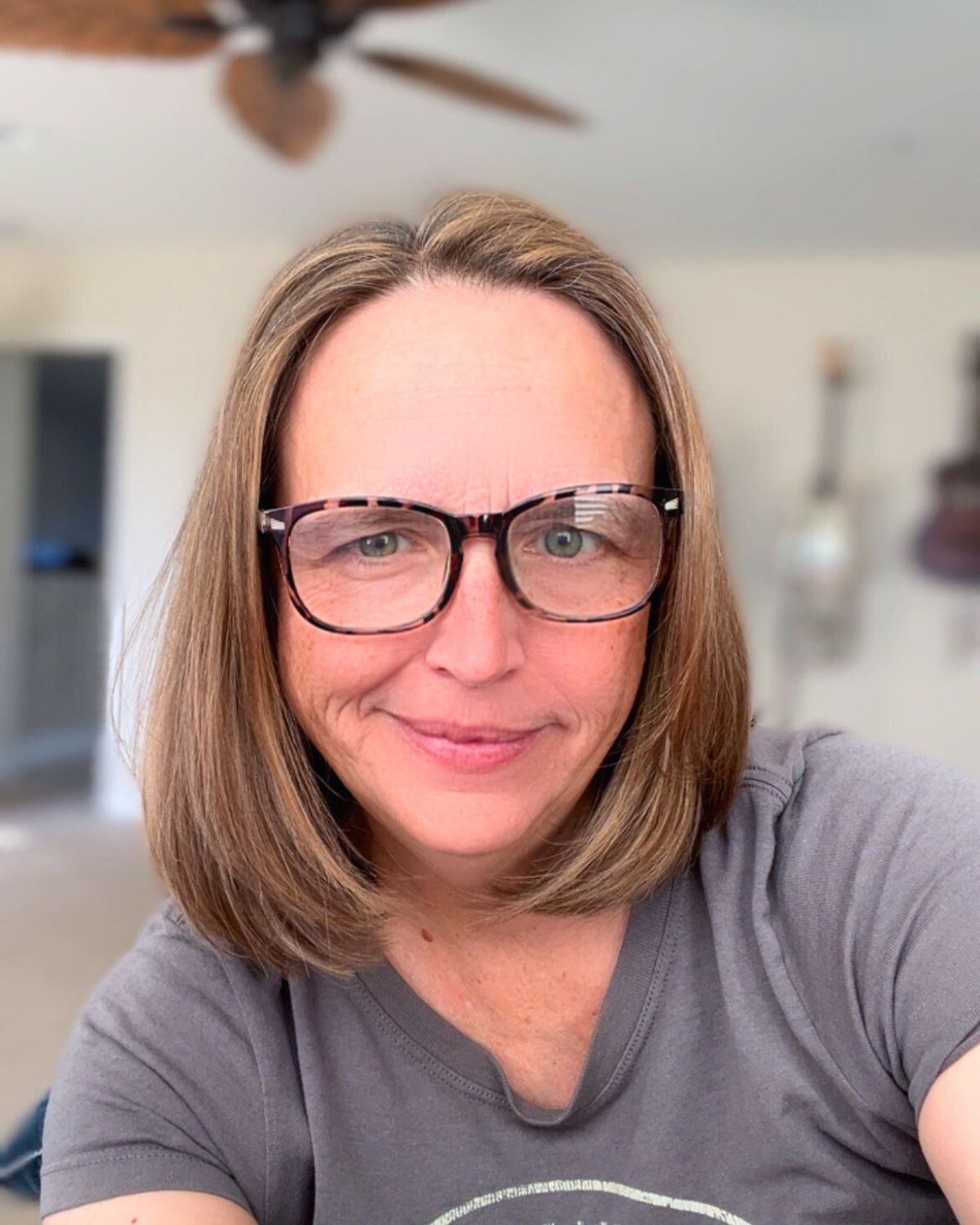 jessica with a new bob and glasses.