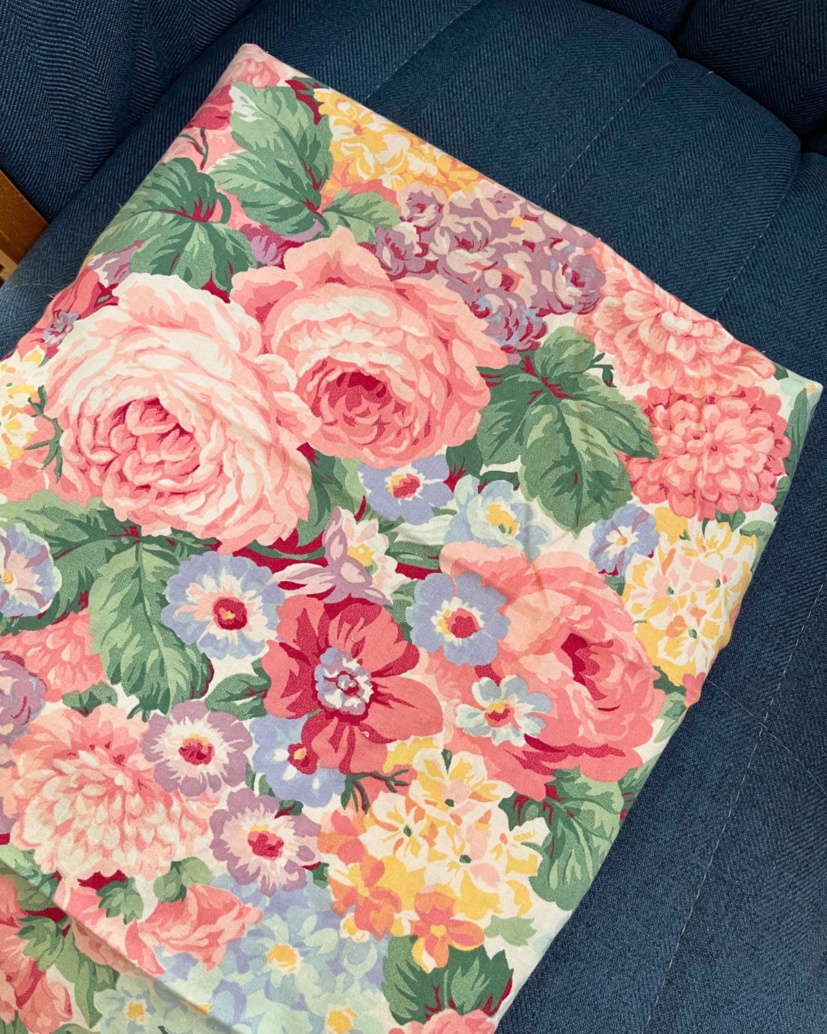 floral fabric on a denim chair.