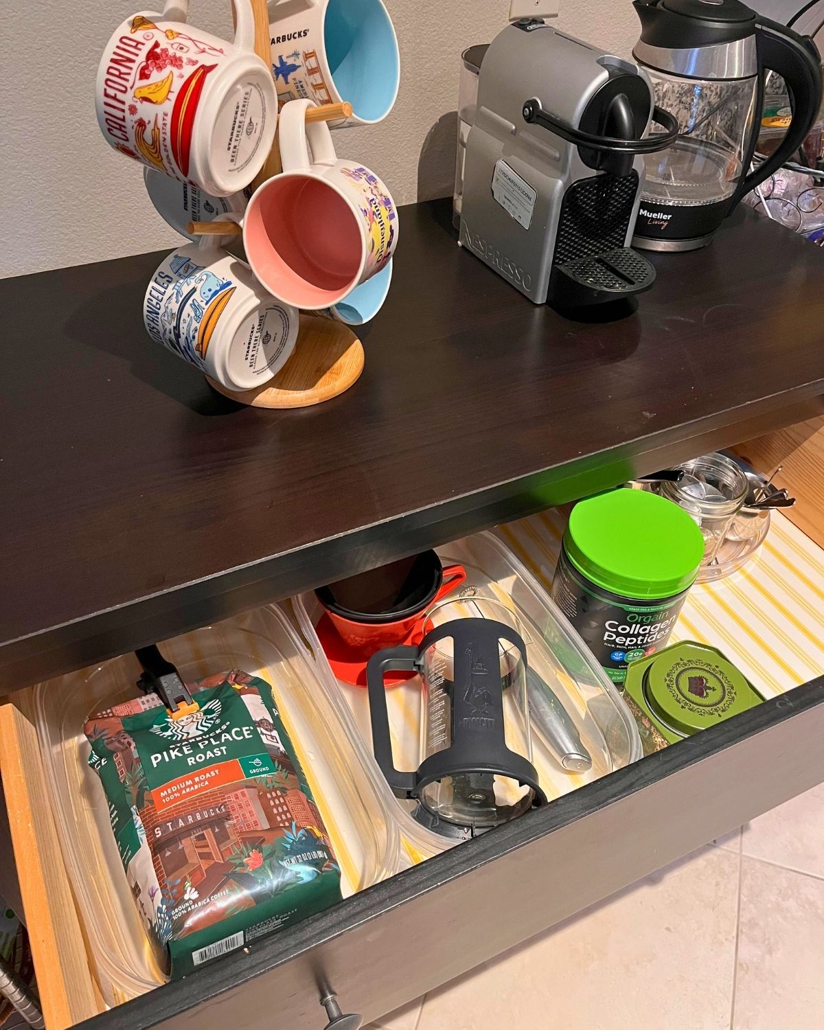 new coffee station with mugs and supplies.