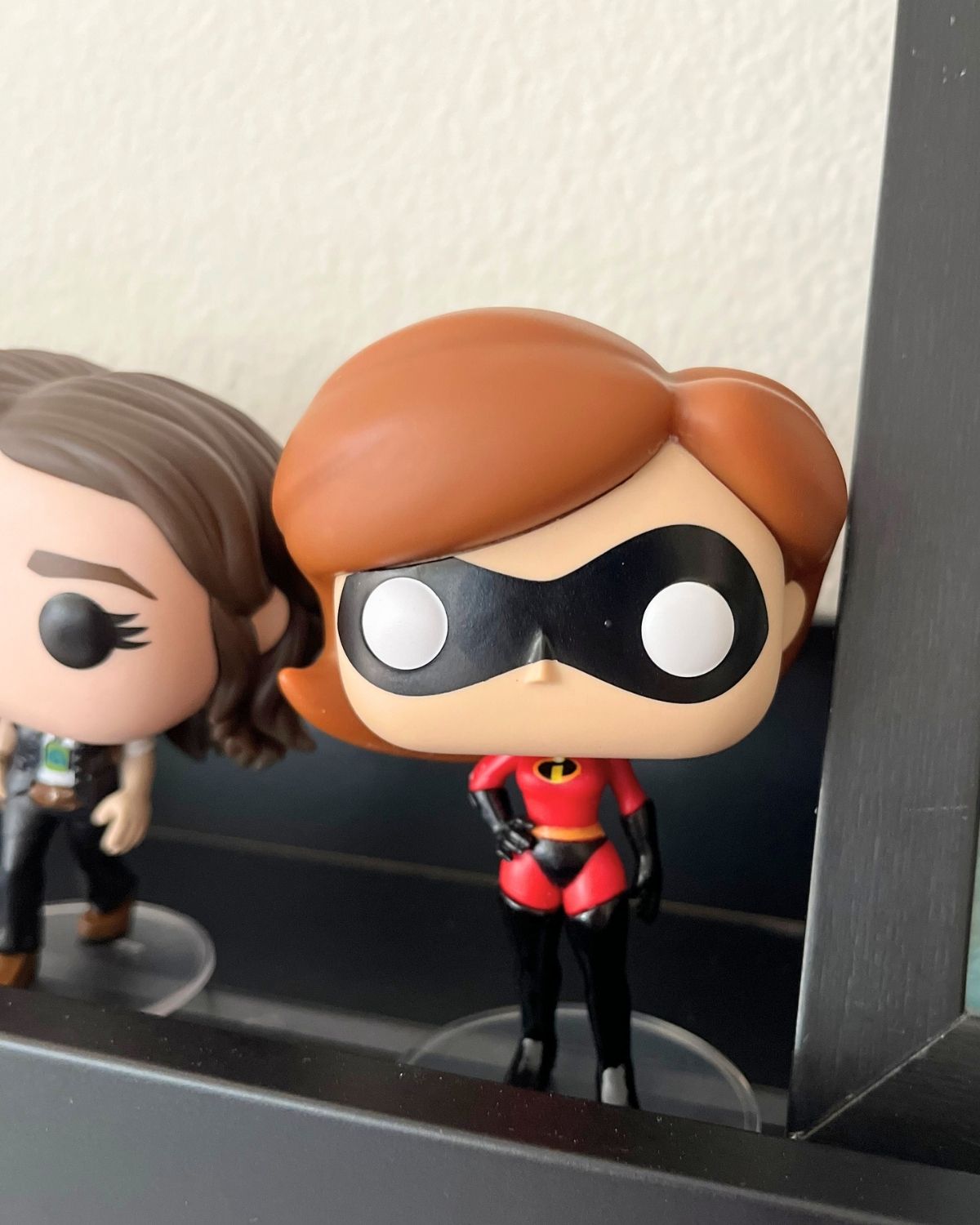 funky pop of elastigirl on shelf.