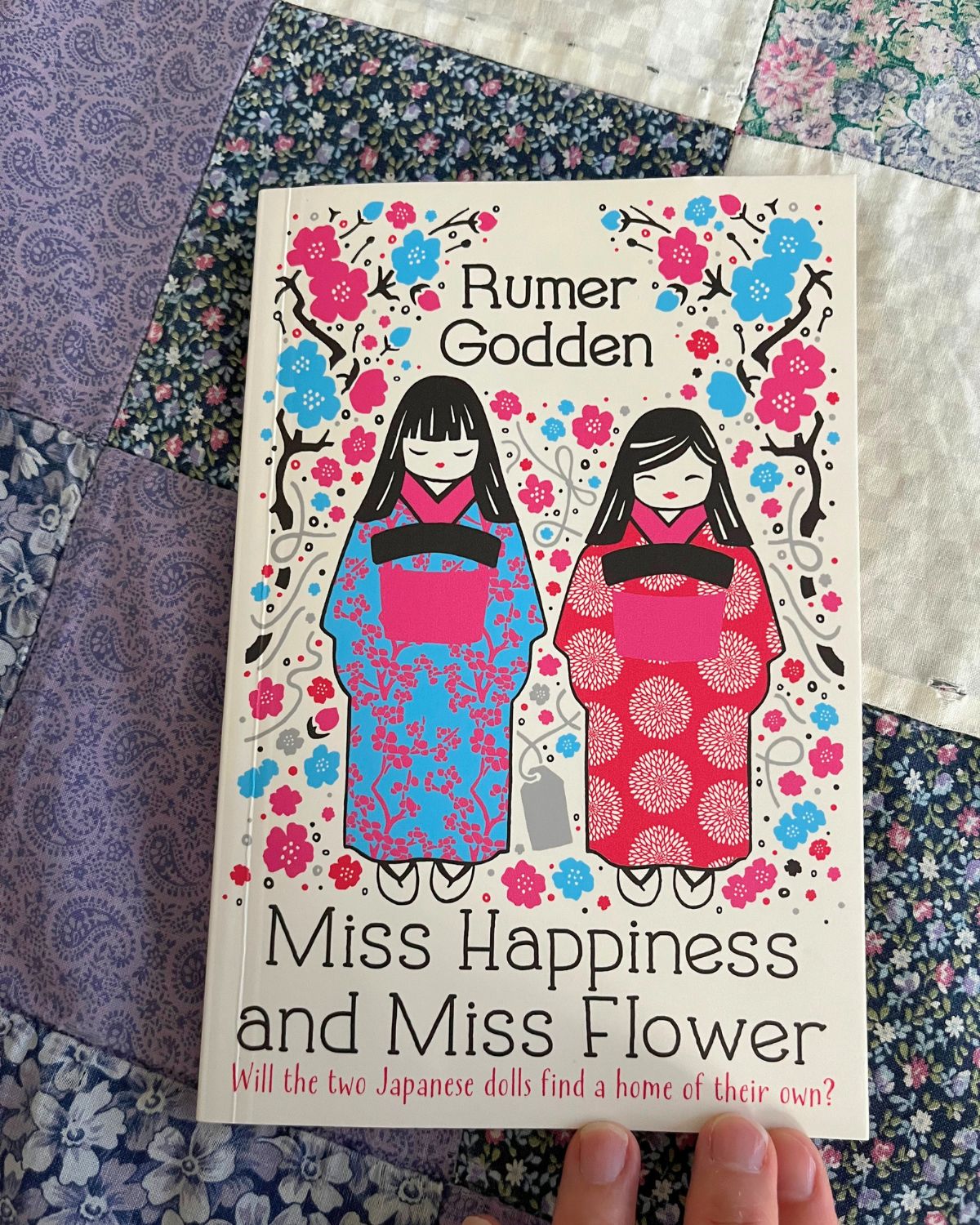 paperback of Miss Happiness and Miss Flower.