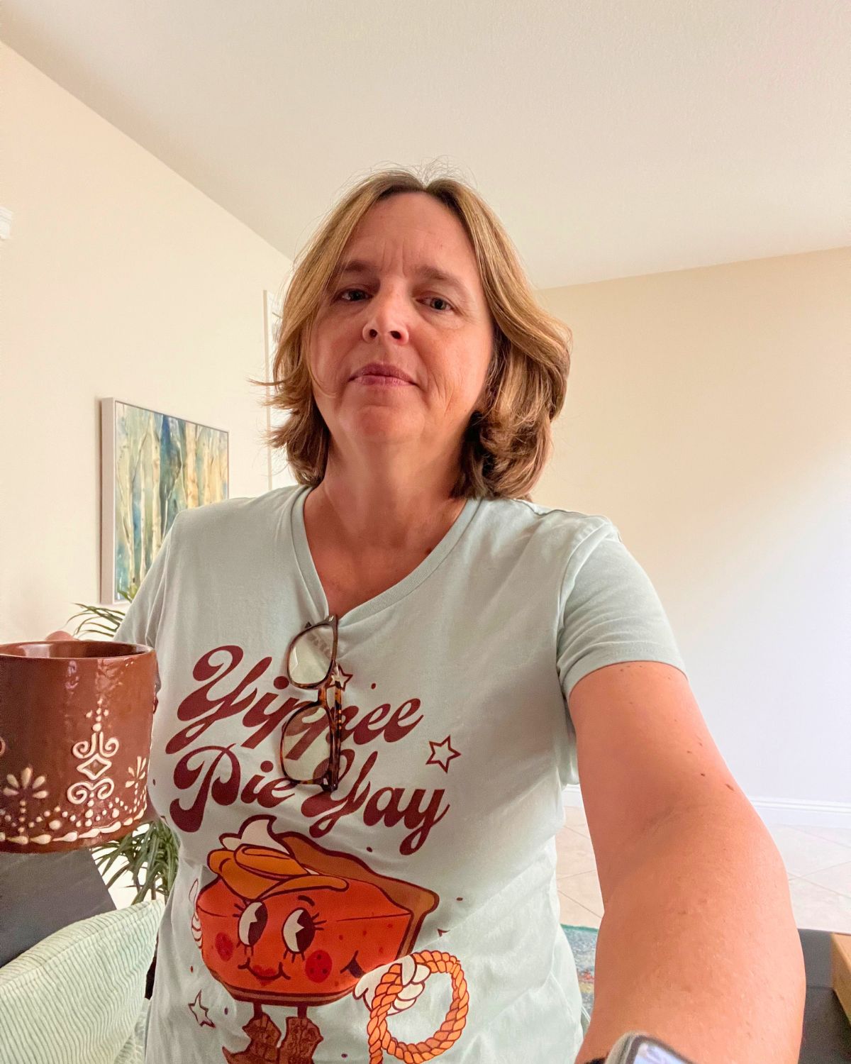 jessica in pie tshirt with gingerbread mug in hand.